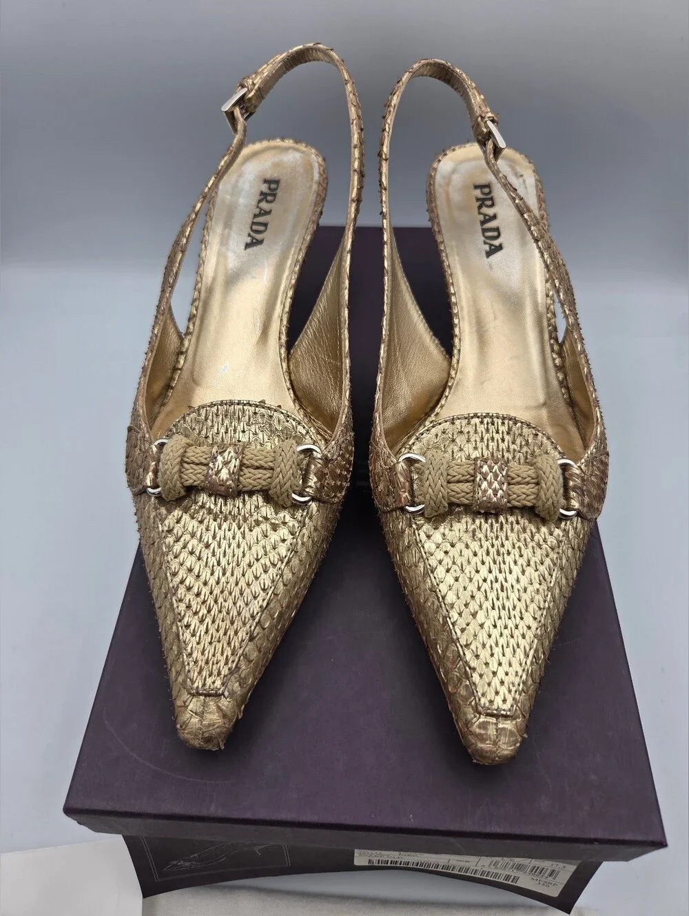 Pre- owned Prada snakeskin braided accents slingback pumps in a metallic gold
